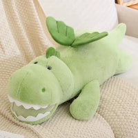 Peluche Petit Dragon Vert Planète Dinosaure - Jouets, Vêtements, Bijoux et Accessoires pour les Fans de Dinosaures