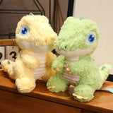 PELUCHE DINOSAURE: peluche dino grand yeux